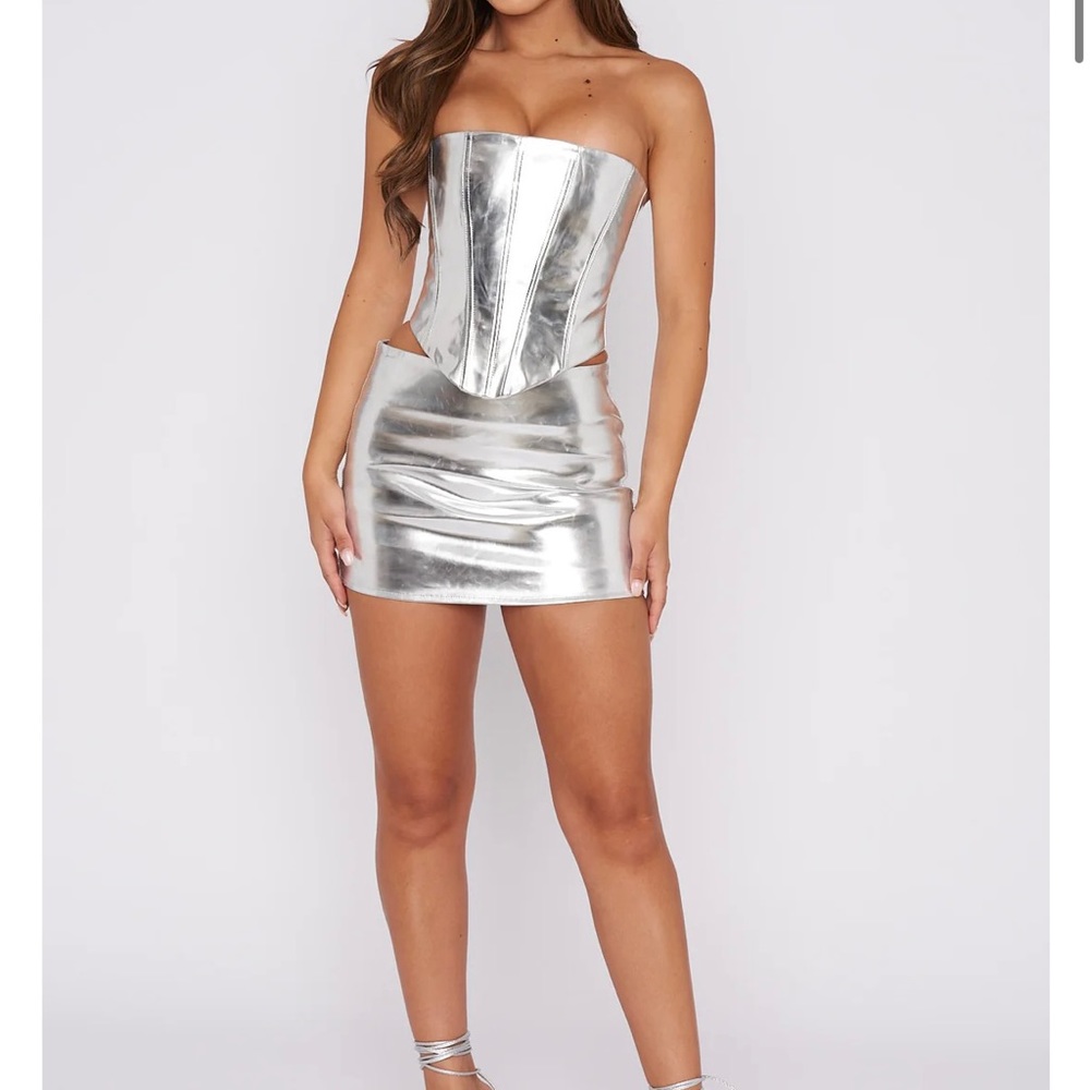 White fox boutique metallic corset and skirt set. Great for the Era’s tour!